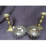 A pair of 19th century bronze candlestands of coronet design and a pair of 19th century brass