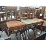 A set of three 19th century oak chapel chairs having Gothic ecclesiastical frames