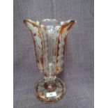 An early 20th century Bohemian design, clear and amber flash cut glass vase of scallop shape