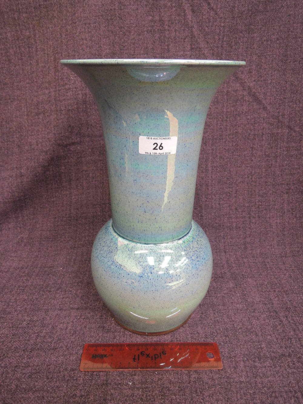 A late 20th century ceramic vase by Tobias Harrison, of blue lustre design, signed