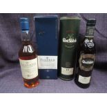 Two bottles of single scotch malt whisky. Talisker 10 year old and Glenfiddich Ancient Reserve 18