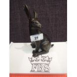 A modern bronze figure by Fine Bronze sculptures modelled as seated hare, signed SA. Numbered 15-49