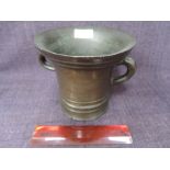 A 19th century cast bronze pharmacy mortar of traditional form