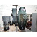 A Whitefriars lemonade jug and six glasses in midnight blue, and a G Baxter vase pattern number 9596