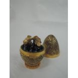 A cased Stuart Devlin 1971 silver gilt limited edition surprise Easter egg having a textured star