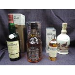 Four bottles of whisky, Famous Grouse 1986 Centenary decanter, Glenlivet 12 year old malt, Chivas