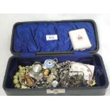 A case of costume jewellery including necklaces, brooches, bangle etc