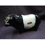 A Rutherfords Scotch Whisky ceramic decanter modelled as a Belted Galloway Bull