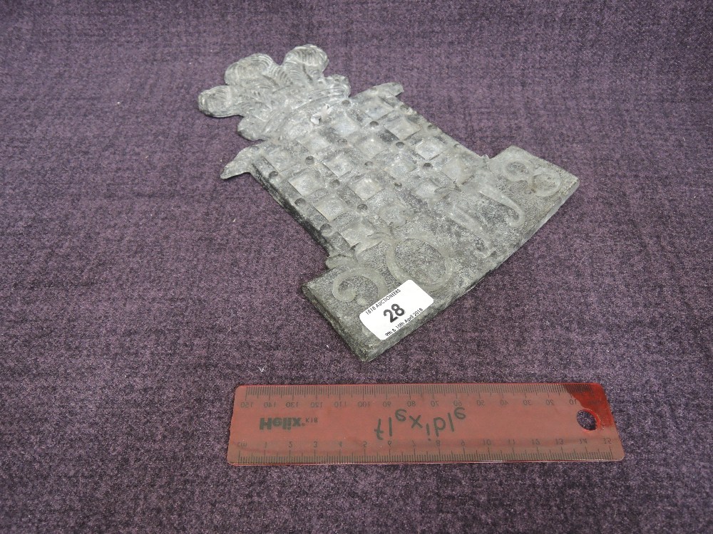 A cast lead fire plaque of Prince of Wales and portculis design, numbered 20118