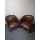 A pair of Edwardian mahogany frame tub armchairs, having line inlay decoration with rexine