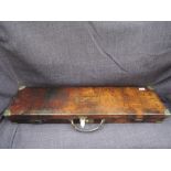 A vintage leather fitted gun case with Holland and Holland large paper label on inside of lid