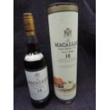 A bottle of Macallan single malt whisky, 18 year old, matured in sherry oak casks, youngest whisky