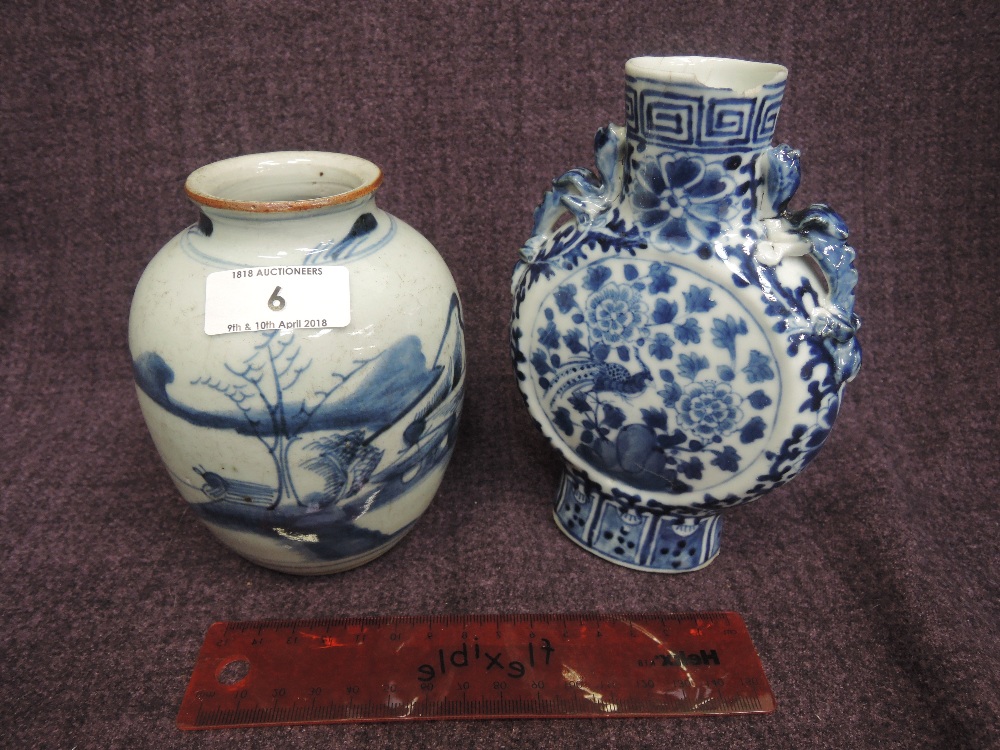 A 19th century Chinese blue and white moon flask having naturalistic decoration and a similar period