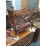 A late 20th century mahogany reproduction Canterbury of traditional slat and drawer design