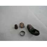 A small selection of HM silver including a band ring, cased thimble, ARP cap badge etc