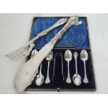 A cased set of six silver teaspoons with matching nips having bright cut decoration to stems and