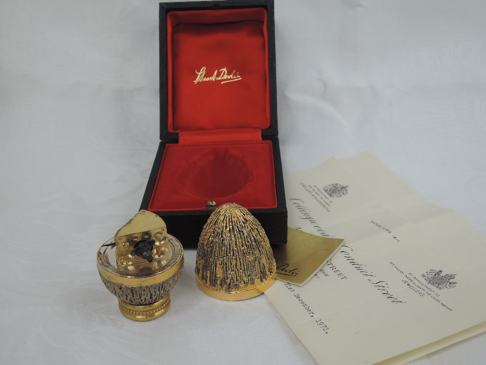 A cased Stuart Devlin 1972 silver gilt limited edition surprise Easter egg having a textured - Image 2 of 2