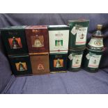 Ten ceramic Christmas decanters of Bells Whisky, 1988, 1989, 1990, 1991, 1992, 1994, 1995, 1996,