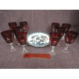 A set of ten mid 20th century ruby and clear wine glasses and a Losolware plate in papillion