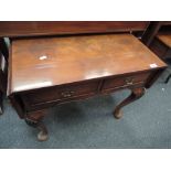 A vintage treen spinning wheel of stylised Breton design