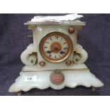 A 19th century alabaster mantel clock in the French style having striking movement