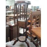 A part 19th century mahogany washstand of circular frame design on triple splay legs