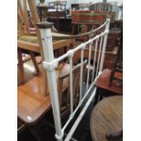 An Edwardian white painted iron and brass single bedstead of rail design