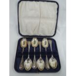 A cased set of six Edwardian silver teaspoons having moulded decoration to stems and monogrammed D