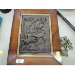 A 19th century Black Forest plaque of rectangular shape having extensive carved decoration depicting