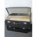 A pair of vintage 1930's shaped travel cases, one labelled Brexton, Made in England, probably car