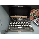 A vintage Underwood portable typewriter with case