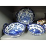 A set of vintage graduated ceramic bowls by Victoria Ware Ironstone flow blue