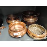 A selection of vintage copper bowls and censers