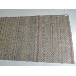 A carpet runner approx 16' x 3'