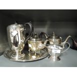 A selection of vintage plated wares from various tea sets