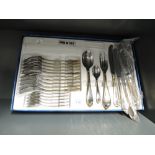 A tray of flatware and cutlery by Cottinghen as new