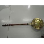 A 19th Century brass warming pan