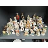 A selection of mixed figures and figurines