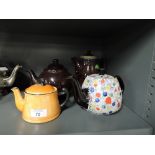 A selection of vintage tea pots including Arthur Wood and lustre style