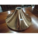 A copper effect light fitting