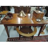 A modern mahogany dining table