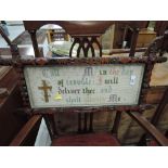 A framed ecclesiastical tapestry scripture