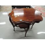 A Victorian style mahogany occasional table