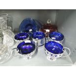 A selection of vintage plated blue glass salt dishes and similar glasswares