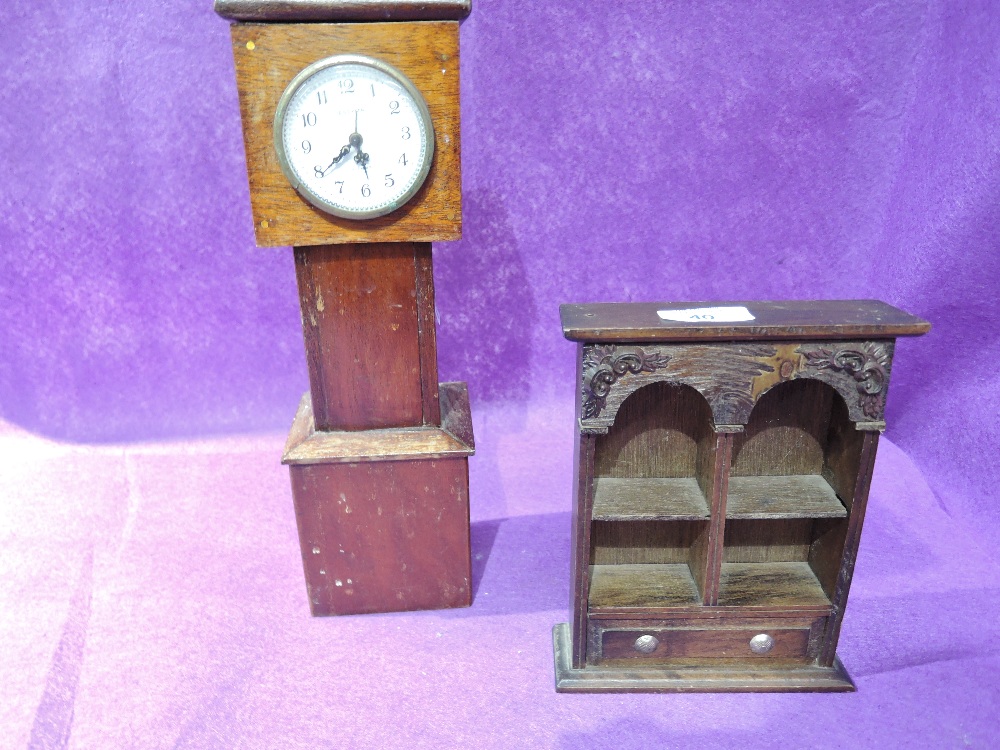 A vintage hand made miniature grand farther clock and small bookshelf