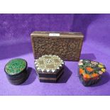 A selection of trinket and jewellery boxes including carved ethnic box