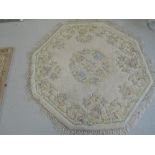 Two cream rugs