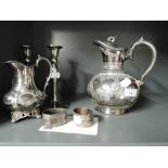 A selection of plated and HMS including solid napkin ring set and elaborate jug pair