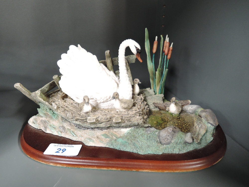 A resin cast figure scene similar to boarder fine arts