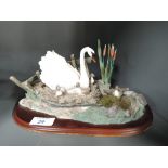 A resin cast figure scene similar to boarder fine arts